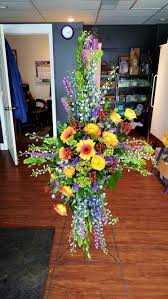 Kutchey's flowers proudly serves midland and the surrounding areas. Pretty Natural Cross Spray 350 At Kutchey S Flowers In Midland Mi Funeral Flower Arrangements Memorial Flowers Funeral Flowers