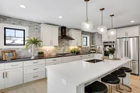 However, you should never mix nickel and chrome in the same space. Expansive Open Concept Kitchen Featuring White Shaker Cabinets Hgtv