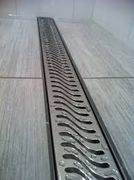 No Curb Or No Dam Shower S Featuring Barrier Free Bathrooms No Hob Installing Linear Shower Drains With A Standa Bath Remodel Shower Floor Bathrooms Remodel