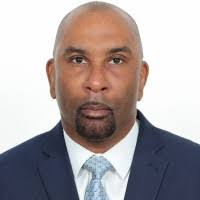 Denis Gray, FCA, MCBI, BSc, MSc, MBA