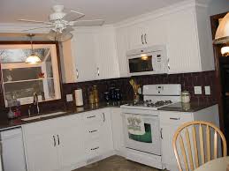 white kitchen cabinets with dark