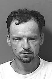 Suspect at large after man shot in front of Juniper Street home