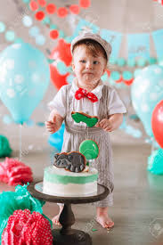 There is nothing cuter than watching a baby smash into their first birthday cake! Adorable Happy Baby Boy Eating Cake One At His First Birthday Stock Photo Picture And Royalty Free Image Image 127170838
