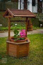 Yes, this looks like a totally traditional old wishing well. 11 We Ll Head Cover Ideas Well Pump Cover Well Pump Outdoor Projects