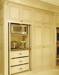 Appliance Storage Built Into Tall Cabinet With Pocket Doors That Way Everything Is Hidden Yet Acc Appliances Design Hide Appliances Kitchen Appliance Storage