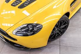Image result for Sunburst Yellow 2017 Aston Martin