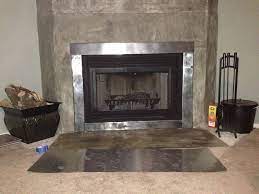 Insert—the fireplace insert is a device inserted into an existing masonry or prefabricated wood fireplace. Sheet Metal Fireplace Surround Fireplace Design Ideas Fireplace Surround Kit Metal Fireplace Metal Fireplace Surround