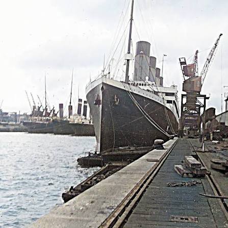 The Titanic is being loaded with thousands of tonnes of coal. It was April 5, 1912, and the main event of the day was the loading of coal into the coal bunkers.