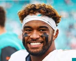 Tua now leads the league in curls in his hair 😂😂😂