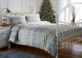Floral pillows in a subtle shade of blue produce a hint of color. Christmas Bedding Sets Great Ideas For A Festive Mood In The Bedroom