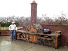 This nantucket outdoor kitchen is the ultimate place to entertain—this one includes a grill, cooktops, a refrigerator, a sink, and even a pizza oven. 92 Pizza Oven Ideas Pizza Oven Pizza Oven Outdoor Outdoor Pizza