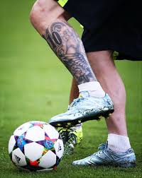 The argentinian has changed his style a lot. Berlin Germany June 05 Lionel Messi Of Barcelona Shows Off His New Tattoo As He Takes Part In A Training Session Prior To Messi Tattoo Lionel Messi Messi