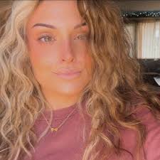 Not very helpful as I was driving: there's a medium size, brown dog  running, very fast, down Wilbraham Road, it's just passed The Lloyd's Pub.  If you've lost your dog it's running