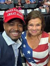I don't know who this lady is but one thing I do know is that we are all  brothers and sisters! We are united. I'm at the Trump Rally in Michigan