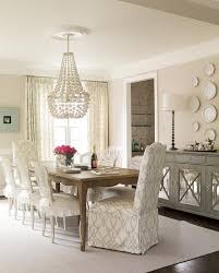 Gray Mirrored Sideboard Under Decorative Wall Plates Transitional Dining Room Beautiful Dining Rooms Dining Room Curtains Elegant Dining Room