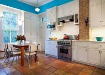 Bringing classic victorian flavor to the modern kitchen in new york with color, tiles and chandelier [from: 20 Interiors That Embrace The Warm Rustic Beauty Of Terracotta Tiles