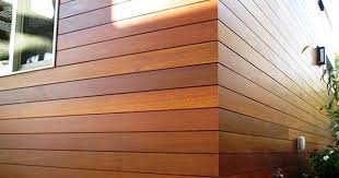 Mangaris And Ipe Siding Beautiful Modern Look Ipe Siding Ipe Hardwood Siding Has The Same Strength A Wood Siding Exterior Exterior Panel Siding Exterior Siding
