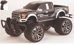 Ford f150 raptor carrera rc in autumn leaves. Amazon Com Carrera Rc Officially Licensed Ford F 150 Raptor Truck 1 14 Scale 2 4 Ghz Remote Radio Control Car Vehicle Toys Games