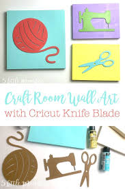 The butterflies and little flowers are scattered on the wall and go well with the flowery bed sheet. 5 Little Monsters Craft Room Wall Art With The Cricut Knife Blade