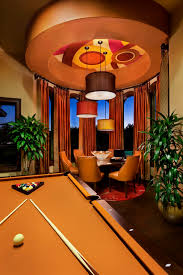 A pool table that doubles as a dining table is an entertainers dream, especially if youre working with a small space. Spanish Oaks Hacienda Mediterranean Family Room Austin By Jauregui Architecture Interiors Construction Houzz