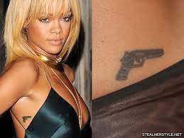 Her latest add to the tattoos collection is a tattoo that wrote in reverse so she can read it in the mirror. Rihanna S Tattoos Meanings Steal Her Style