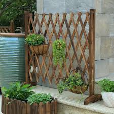 Wireless dog fences are effective in terms of keeping a dog in the yard. Garden Fence Cedar Wood Expending Wooden Fence Patio Climbing Plants Portable Room Divider Wood Panel Screen Dog Gate Kid Safety Buy Small Garden Fence Garden Border Fence Vegetable Garden Fencing Product On Alibaba Com