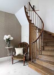 Black spiral staircase twists through joseph store in miami design district. Georgian Interiors Stairs Design Interior Stairs