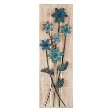 A great way of organizing such is to draw an imaginary rectangle and the area of the wall you wish to concentrate on. Blue Turquoise Metal Flower Wall Decor Hobby Lobby 1299478