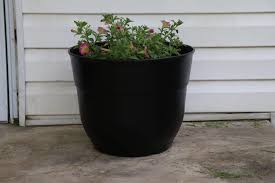 How To Spray Paint Your Garden Planter Pot Pineapple Outfitter In 2020 Garden Planters Pots Planter Pots Garden Planters