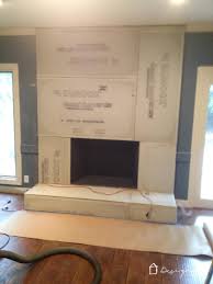 Make a statement with a wood plank fireplace makeover. Diy Concrete Fireplace For Less Than 100 Designertrapped Com