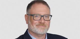 Watch: Anti-Trans Jeff Younger Heckled as "Fascist" by Students