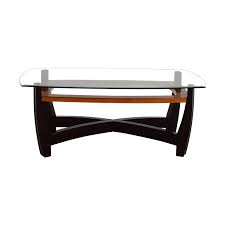 A unique coffee table can really draw in the personality of a room, and this dunhill glass coffee table will give your living room the touch of character it needs. 76 Off Raymour Flanigan Raymour Flanigan Rectangular Glass Top And Wood Coffee Table Tables