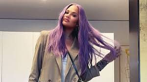 During a long vacation with her family in bali, she gave her fans. Chrissy Teigen Debuts Purple Hair The Wig Life Chose Me