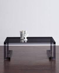 For both style and glamour in your interior, pick this bullet acrylic coffee table today and flaunt your taste of chic home designs! Constance Noire Black Acrylic Coffee Table