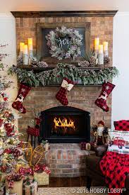 If you have a fireplace at home, you should decorate it for christmas! Cozy Cabin Charm Meets Traditional Holiday By Coupling Warm And Rustic Accent Pie Christmas Mantel Decorations Christmas Mantle Decor Christmas Fireplace Decor