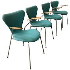 Available in a light grey or charcoal fabric finish. 1955 Arne Jacobsen Set Of Four Turquoise Upholstered 3207 Butterfly Armchair Fabric Dining Room Chairs White Leather Dining Chairs Antique Dining Room Chairs
