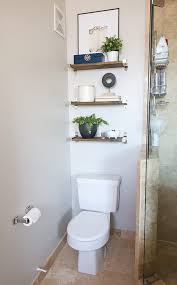 Bathroom Decor Mistakes Over The Toilet Storage The Diy Playbook Toilet Storage Over Toilet Storage Shelves Over Toilet