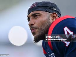 William Stanback of the Montreal Alouettes accepts the handoff... News  Photo