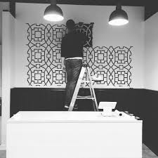 Black And White Wall Stencil Designs Stenciling An Accent Wall In Black And White Using The Tea House Trellis Stencil An Oversized Geom White Wall Stencil Accent Wall Designs Trellis Wall Stencil