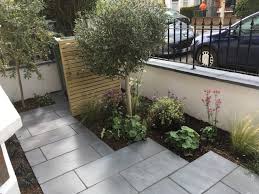 The black mulch completes this modern landscape design transformation. Small Front Garden Rachel Hartley Garden Design