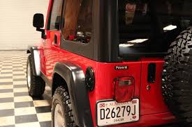 Image result for Flame Red 2006 Jeep