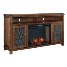 The Tamonie 72 Media Fireplace From Ashley Furniture Has A Vintage Look With A Rustic Brown Fin Electric Fireplace Tv Stand Fireplace Tv Stand Large Tv Stands