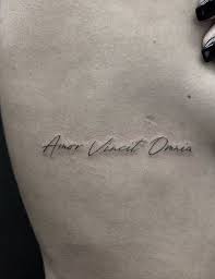 Amor Vincit Omnia Tattoo