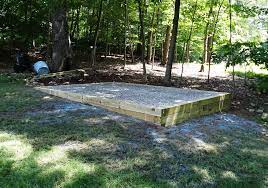 What about filling a sonotube (that's buried 3 feet in the ground) and reached all the way up. Reliable Shed Site Preparation Gravel Concrete Bases Sloped Backyard Landscaping Sloped Backyard Backyard