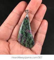 A combination of red and blue, violet straddles the spectrum, being warm and cool at the same time. Beautiful Green And Purple Natural Ruby In Zoisite Stone Pendant Wpnkprsssay