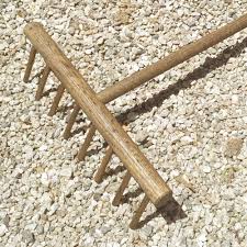 The japanese rock garden (枯山水, karesansui) or dry landscape garden, often called a zen garden, creates a miniature stylized landscape through carefully composed arrangements of rocks, water features, moss, pruned trees and bushes. Hand Made Oak Zen Rake For Zen Rock Gravel Gardens