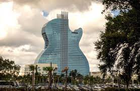 Bébé bink est l'héritier d'une riche famille et attire, par conséquent les convoitises. Un Hard Rock Hotel En Forme De Guitare Inaugure En Floride Photos Le Soir