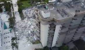 El video del momento del colapso del champlain towers cámaras de seguridad registraron la caída de la estructura en surfside esta madrugada; Vy6r34al1ycsem