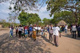 Find the perfect african people stock photos and editorial news pictures from getty images. Angola Africa April 5 2018 African People Standing On Village Street And Showing Greeting Gesture With Hands Poverty Traditional Stock Photo 204199918