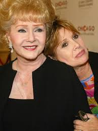Debbie Reynolds, 84, dies a day after daughter Carrie Fisher's death